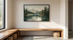 a serene indoor setting with a large painting of a forest landscape hanging on the wall above a wooden bench. The painting depicts a tranquil scene of a lake surrounded by trees, creating a peaceful and natural atmosphere.