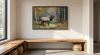 a large painting of a majestic elk standing in a forest, with its antlers reaching towards the sky. The painting is hung on a white wall above a wooden bench, which is situated in a room with a window and a basket on the floor.
