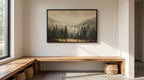 a serene indoor setting with a large painting of a forest landscape hanging on the wall above a wooden bench. The painting depicts a tranquil scene of a forest with a lake in the background, creating a peaceful and calming atmosphere.