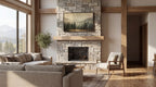a cozy living room with a stone fireplace, a large window overlooking a scenic mountain landscape, and a comfortable seating arrangement with a couch and a chair.