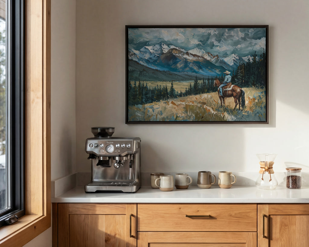 a cozy kitchen scene with a framed painting of a cowboy on a horse, a coffee machine, and various coffee cups and mugs on the countertop.