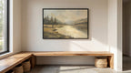 a serene landscape painting hanging on a white wall, with a wooden bench and woven baskets below it.