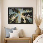 a large framed painting of a forest scene hanging on a wall, with a wooden bench and a woven basket nearby.